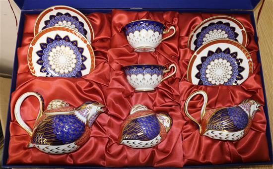 A Royal Crown Derby quail shape 9 piece tea set